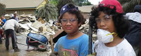 Boys volunteering for flood cleanup